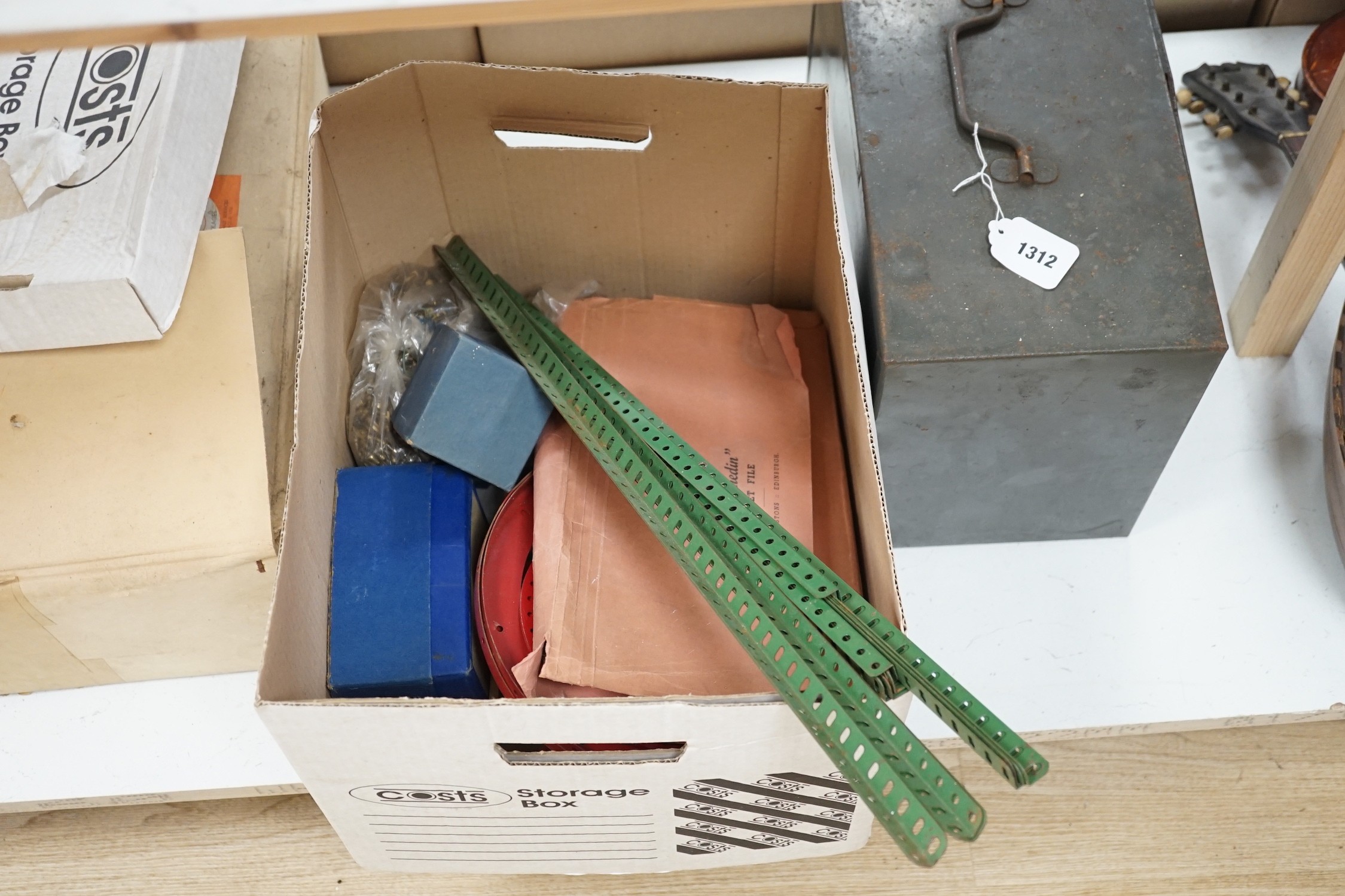 A quantity of Meccano tracks and manuals etc